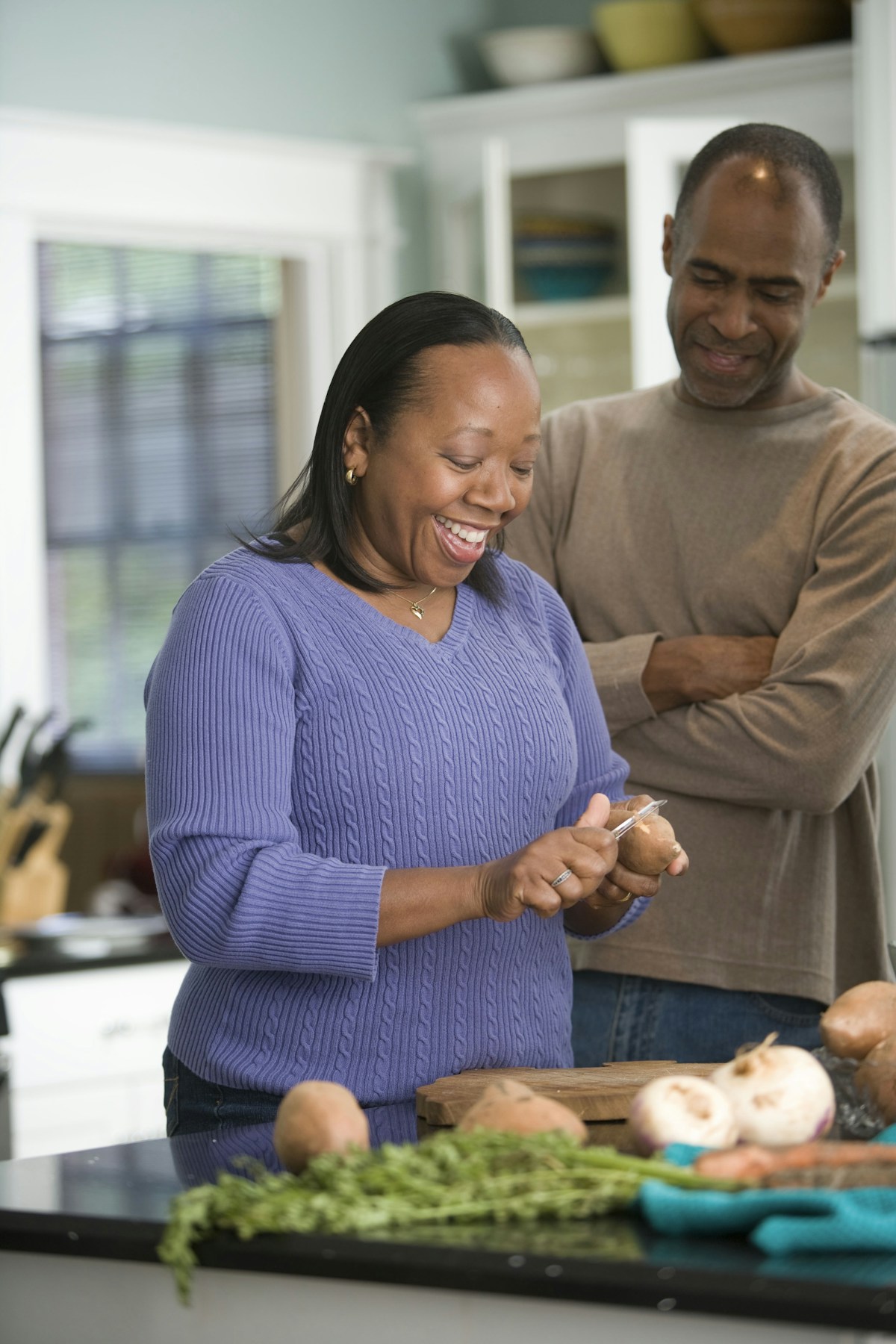 A couple enjoying everyday life together at home